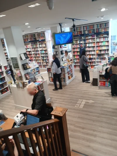 A windows screensaver on a display screen in a bookshop